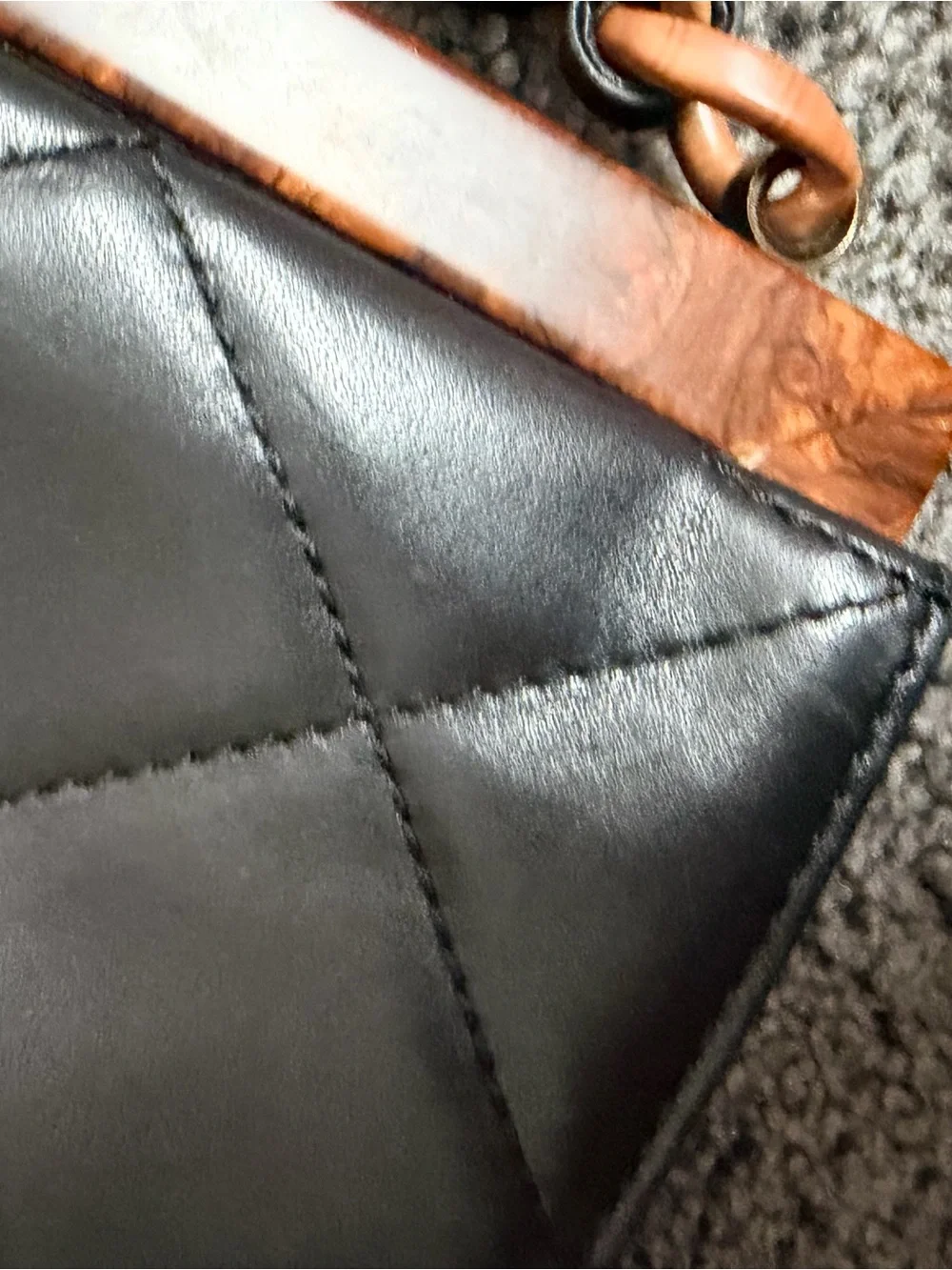 CHANEL Black Quilted Leather Shoulder Bag with Brown Chain